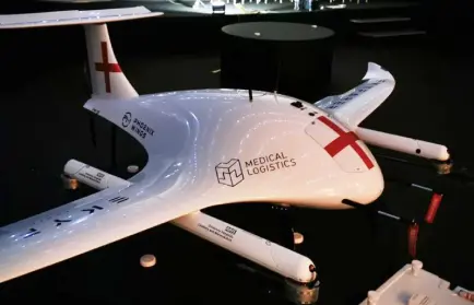 A large white drone with a red cross and the Medical Logistics logo